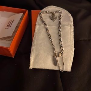 Retired James Avery bracket and a retired dove charm.